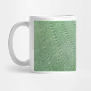 Aerial view of green field of grain Mug